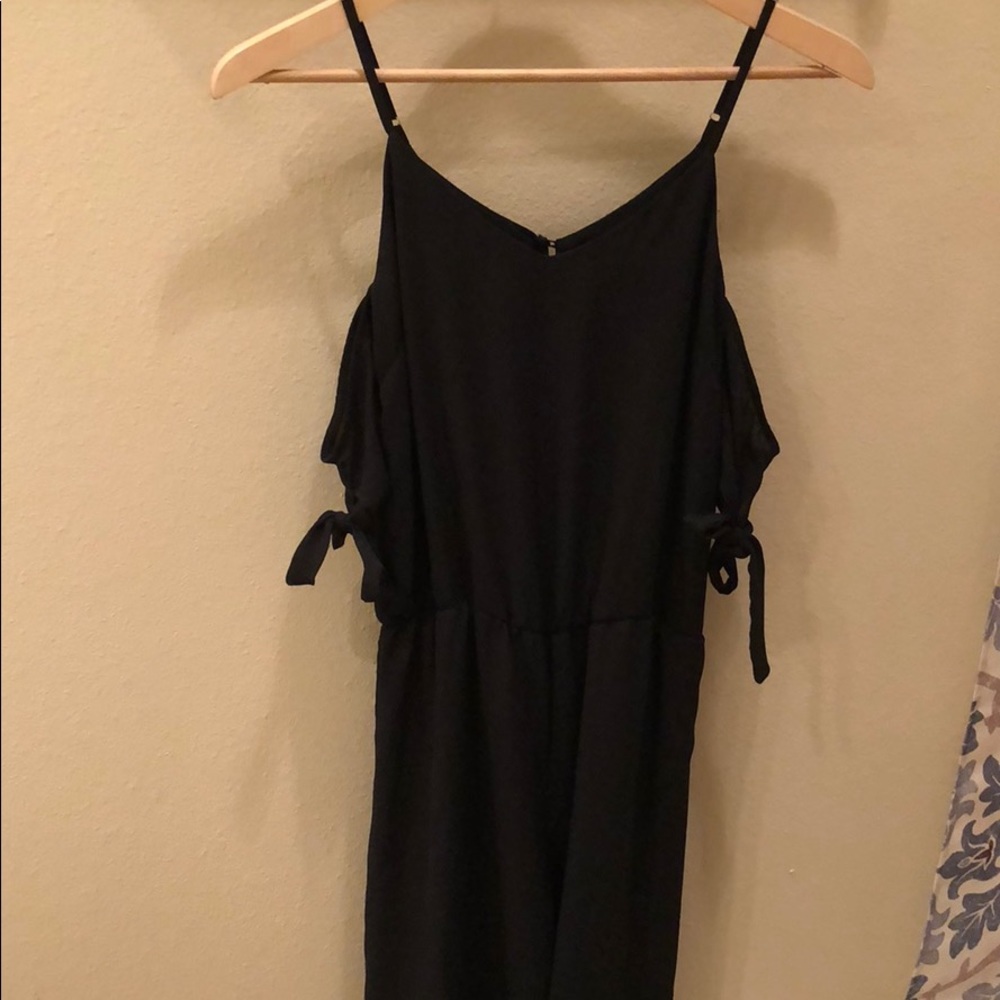 Black peep shoulder jumpsuit